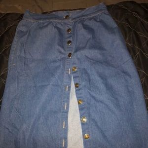 Medium button down jean dress. New.